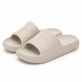 Claquettes 42/43 en matière synthétique blanc cassé à bride tressée pour intérieur et extérieur